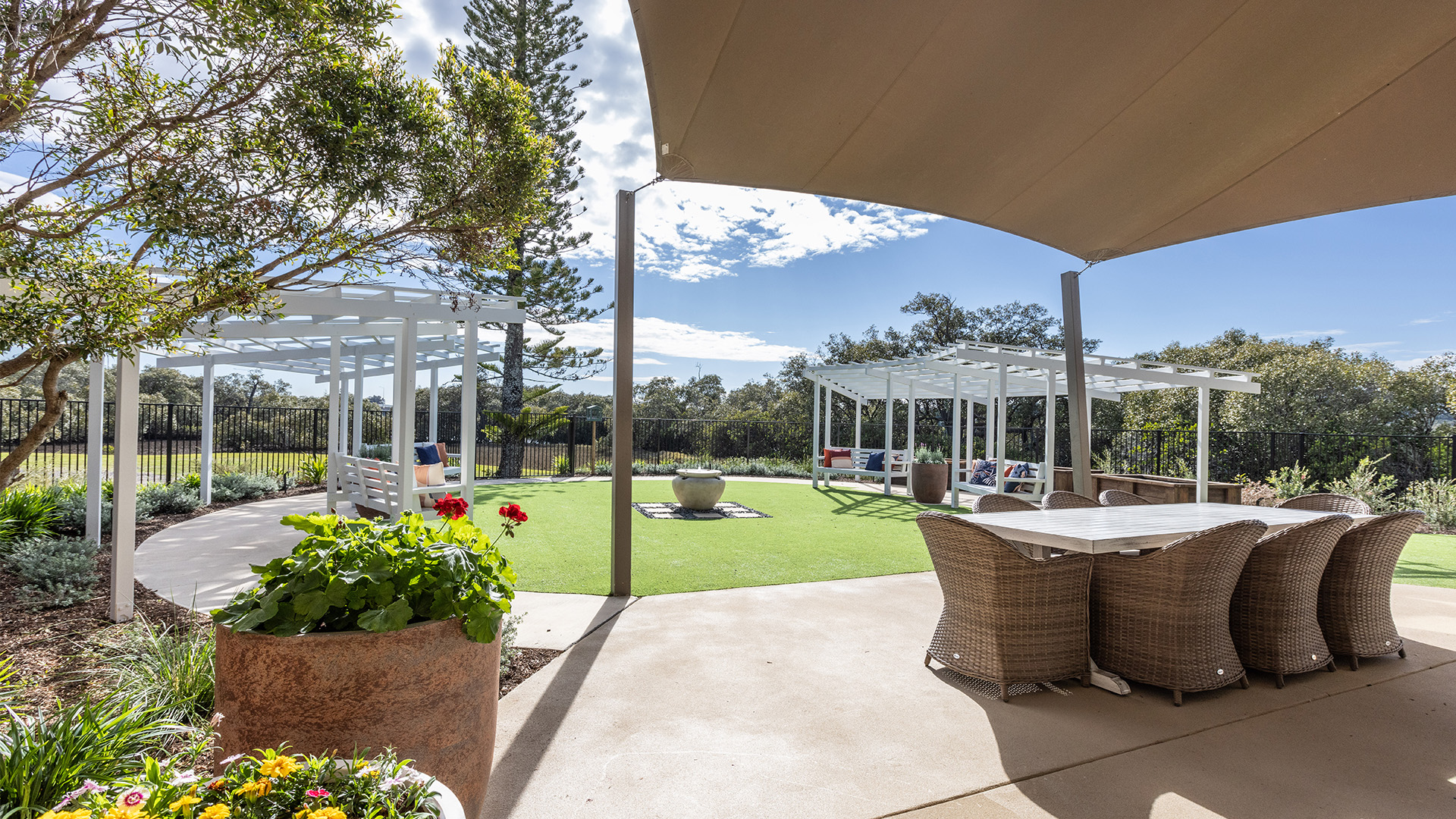 outdoor garden area with seating, table and footpath located in Lighthouse Wing